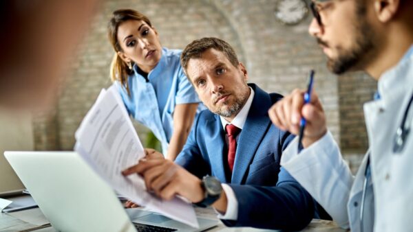 Clinical Research Associate reviewing clinical trial documentation